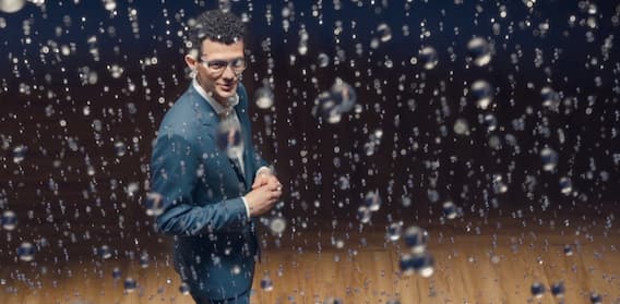 Abbott brand advertising — a man amid suspended water droplets